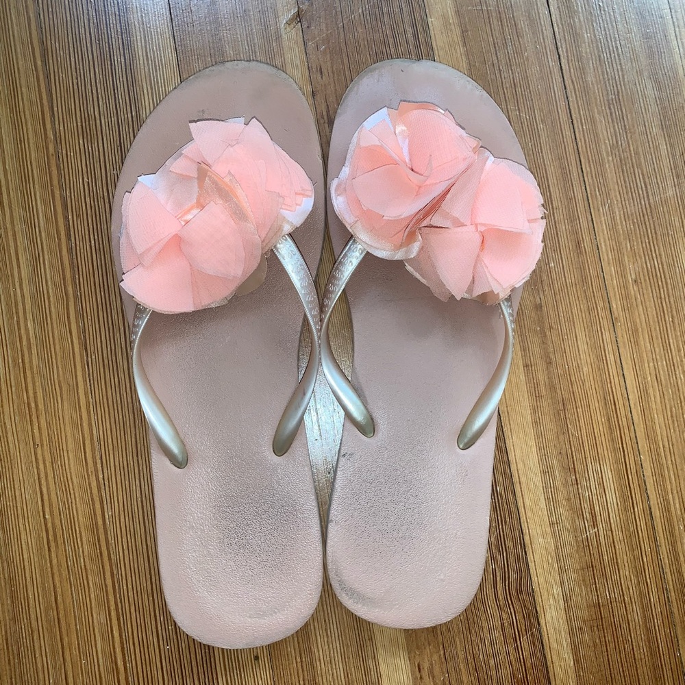 Coral floral flip flops